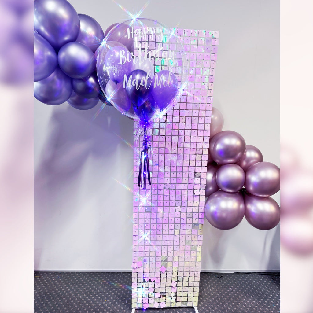 Luxe Shimmer Panel IRIDESCENT with Balloon Garland and Personalised Sign Hire