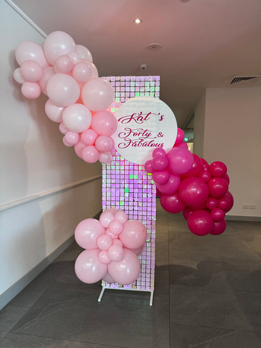 Luxe Shimmer Panel IRIDESCENT with Balloon Garland and Personalised Sign Hire